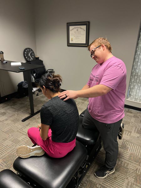 Chiropractor providing postural correction services in Kearney