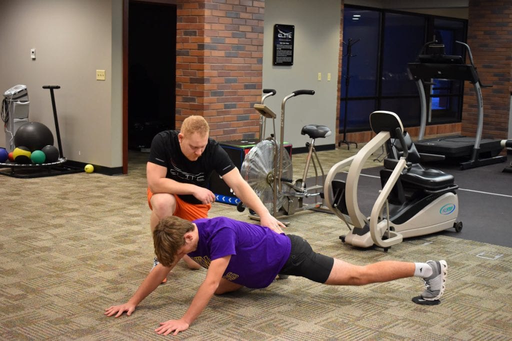 Athlete gets sports chiropractic care in Kearney.